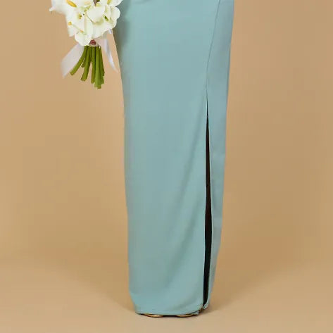 Light blue pants with a black stripe on a beige background