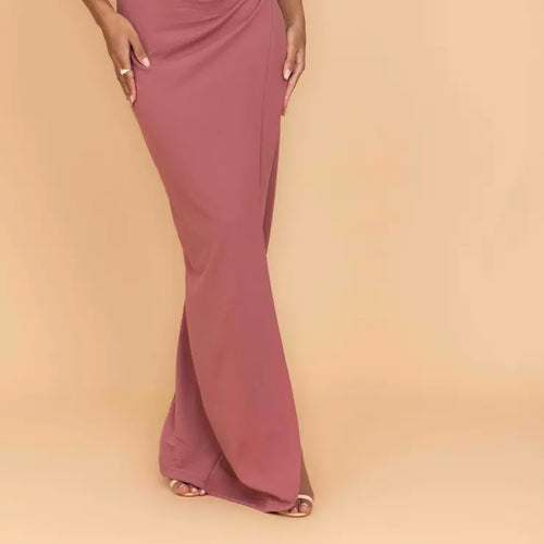 Mauve evening gown on a beige background
