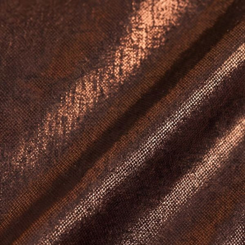 Close-up of brown fabric with subtle pattern
