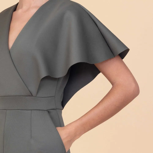 Gray dress with a wide collar on a beige background