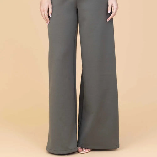 Gray wide-leg pants on a beige background